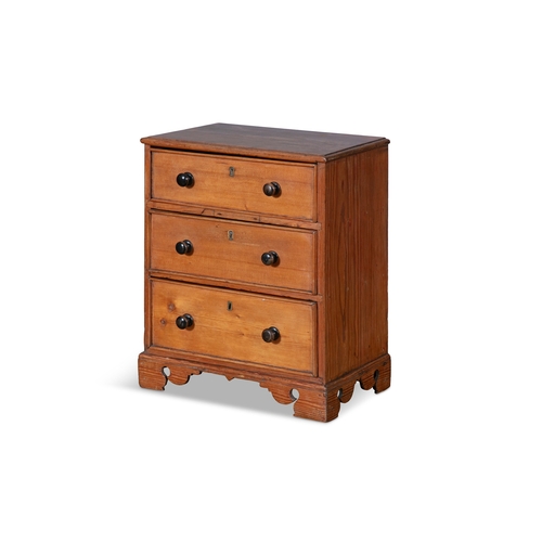 223 - A STAINED PINE APPRENTICE CABINET MAKER’S MINIATURE CHEST OF DRAWERS, 19TH CENTURY,  the moulded top... 