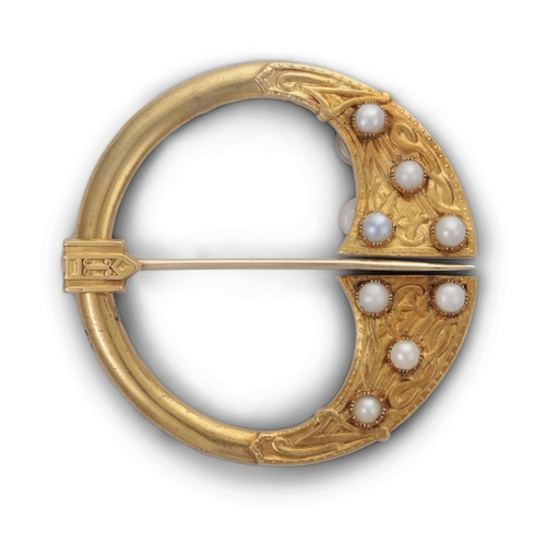 42 - A RARE GOLD VICTORIAN CELTIC PENNANULAR BROOCH,   c.1850s, the obverse applied with seed pearls and ... 