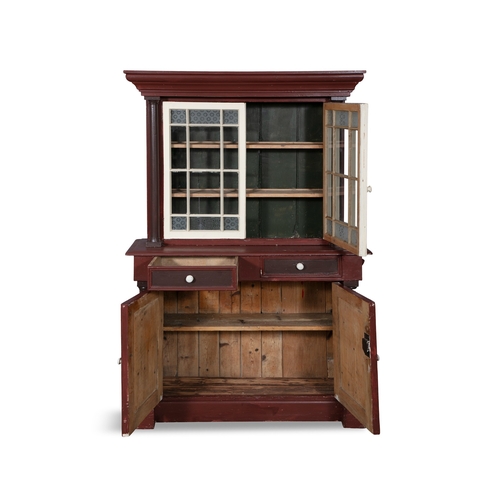 50 - A 19TH CENTURY PAINTED PINE DRESSER,  the moulded cornice above twelve panel glazed doors flanked by... 