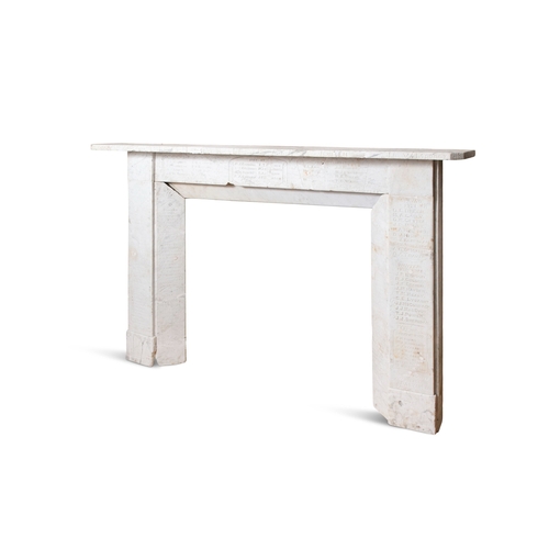 73 - A WHITE MARBLE FIREPLACE  186 cm high, 131cm wide     This carved and antique graffitied fireplace s... 