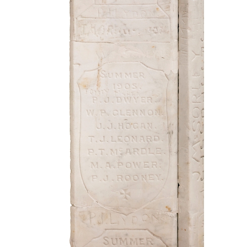 73 - A WHITE MARBLE FIREPLACE  186 cm high, 131cm wide     This carved and antique graffitied fireplace s... 