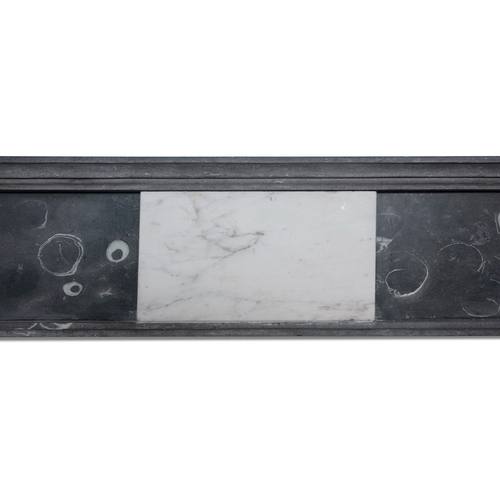 74 - A KILKENNY BLACK MARBLE FIREPLACE C. 1800  with frieze pediment on plain column supports. 148cm wide... 