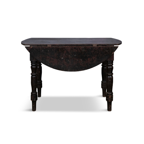 79 - A BLACK PAINTED PINE OVAL DROP LEAF TABLE,  plain frieze raised on turned baluster legs. 75cm high, ... 