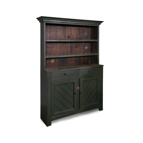 86 - A GREEN PAINTED PINE DRESSER,  the moulded cornice above two open shelves and plain slated back, the... 