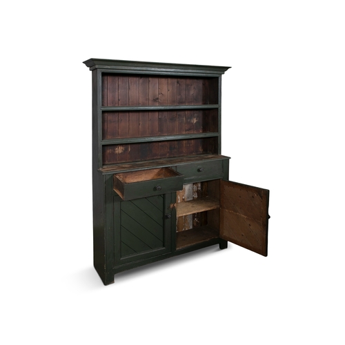 86 - A GREEN PAINTED PINE DRESSER,  the moulded cornice above two open shelves and plain slated back, the... 