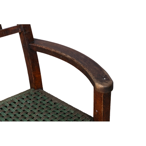 97 - A STAINED WOOD RAILBACK SUGAN CHAIR  with bowed arm supports, woven seat on square supports with str... 