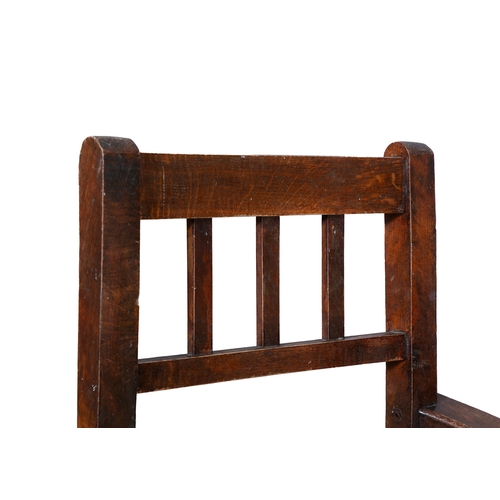 97 - A STAINED WOOD RAILBACK SUGAN CHAIR  with bowed arm supports, woven seat on square supports with str... 