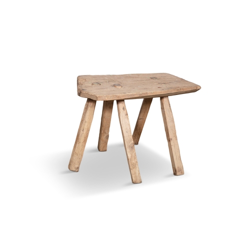 98 - A PLAIN PANEL MILKING STOOL  with five spindle supports. 34cm high, 40cm wide