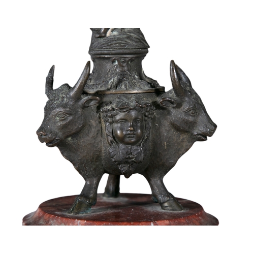 15 - A GRAND TOUR BRONZE INKPOT AND COVER, 19TH CENTURY  the cover surmounted by cupid riding a dolphin a... 