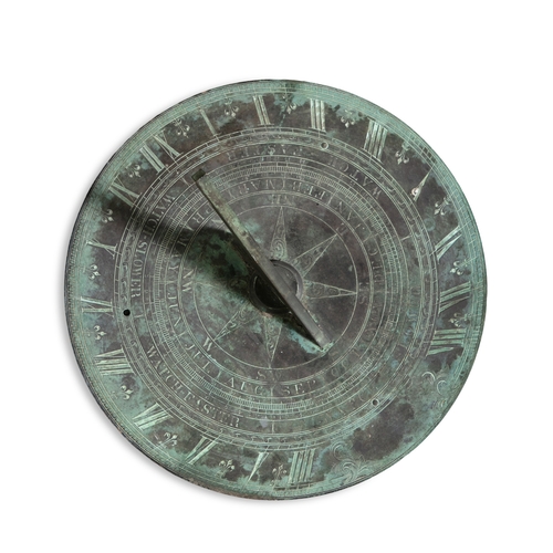 3 - A VICTORIAN BRONZE CIRCULAR SUNDIAL  the flattened panel engraved with an outer band of Roman numera... 