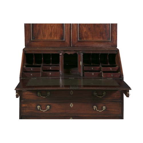 57 - A FINE IRISH GEORGE III FIGURED MAHOGANY BLIND DOOR BUREAU BOOKCASE  with an architectural pediment ... 