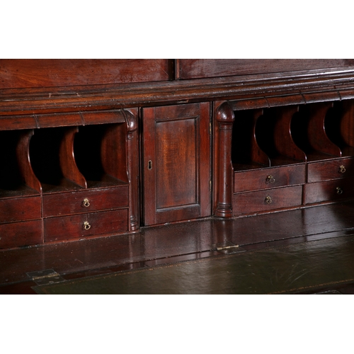 57 - A FINE IRISH GEORGE III FIGURED MAHOGANY BLIND DOOR BUREAU BOOKCASE  with an architectural pediment ... 