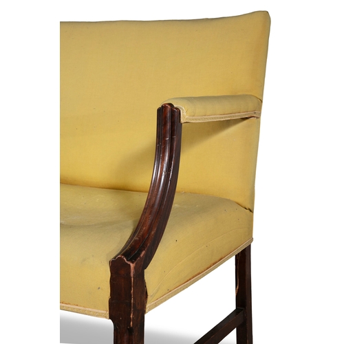 60 - A GEORGE III MAHOGANY FRAMED TWO-SEATER SETTEE, C.1800  with reeded arm supports and tapering inswep... 