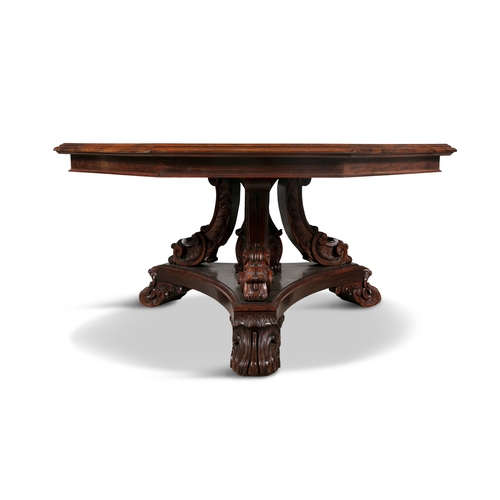 67 - A VICTORIAN ROSEWOOD OCTAGONAL BREAKFAST TABLE,  with stepped moulded rim, on carved scroll triparti... 