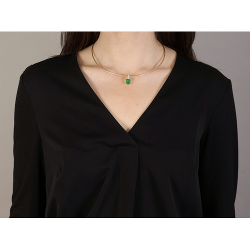 108 - AN EMERALD AND DIAMOND PENDANT NECKLACE  The rectangular cut-cornered emerald weighing approximately... 