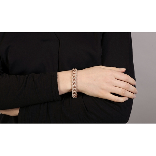 123 - A DIAMOND GOURMETTE BRACELET  The curb-link chain bracelet pavé-set with brilliant-cut diamonds thro... 