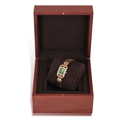 125 - AN 18K GOLD AND GEM-SET 'CAPE COD' BRACELET WATCH, BY HERMÈS  Of quartz movement, the square green n... 