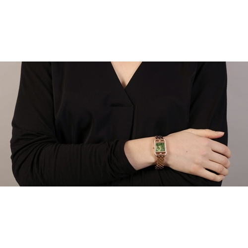 125 - AN 18K GOLD AND GEM-SET 'CAPE COD' BRACELET WATCH, BY HERMÈS  Of quartz movement, the square green n... 