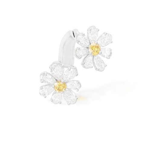 143 - A DIAMOND DRESS RING  Composed of two flowerheads, each set with a brilliant-cut diamond of yellow t... 