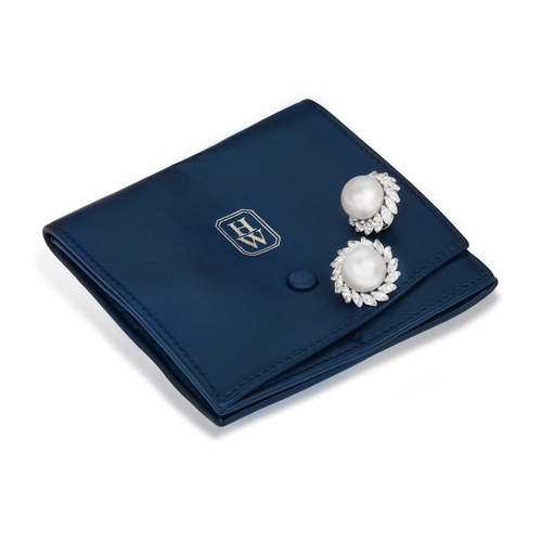 150 - A FINE PAIR OF CULTURED PEARL AND DIAMOND EARCLIPS, BY HARRY WINSTON  Each cultured pearl measuring ... 