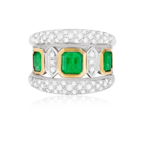 154 - AN EMERALD AND DIAMOND RING  Of bi-coloured design, the openwork ring set with three square-shaped e... 