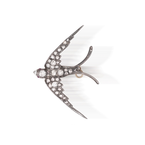 18 - A LATE 19TH CENTURY DIAMOND BROOCH, CIRCA 1880  Designed as a swallow in flight, set throughout with... 