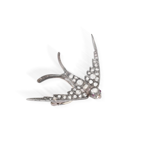 18 - A LATE 19TH CENTURY DIAMOND BROOCH, CIRCA 1880  Designed as a swallow in flight, set throughout with... 