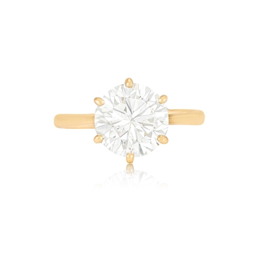 191 - A DIAMOND SINGLE-STONE RING  The brilliant-cut diamond within a six-claw setting, to a plain hoop, m... 