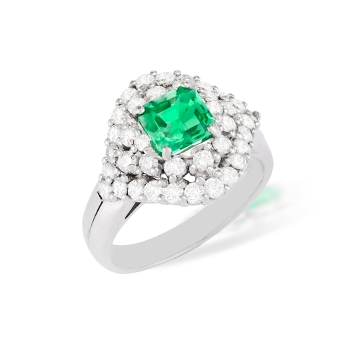 205 - AN EMERALD AND DIAMOND RING  The raised mount centring a square-shaped emerald weighing approximatel... 