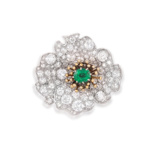 21 - A LATE 19TH/ EARLY 20TH CENTURY EMERALD AND DIAMOND BROOCH  Designed as a stylised flowerhead, centr... 