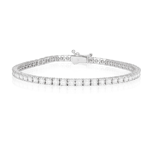 213 - A DIAMOND LINE BRACELET  The continuous line of brilliant-cut diamonds, within claw-setting, mounted... 