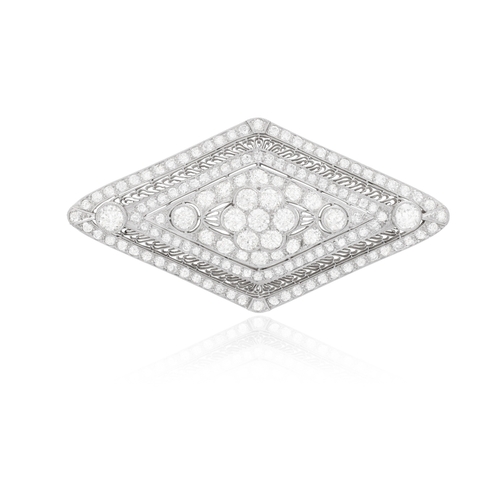 22 - AN EARLY 20TH CENTURY DIAMOND BROOCH  Of lozenge-shaped openwork design, centring a flower motif, mi... 