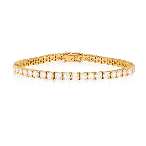 222 - A DIAMOND LINE BRACELET  Composed of a continuous line of brilliant-cut diamonds within claw-setting... 