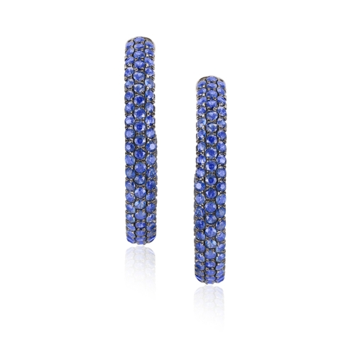 243 - A PAIR OF SAPPHIRE HOOP EARRINGS  Each pavé-set with circular-cut sapphires, mounted in 18K gold, le... 