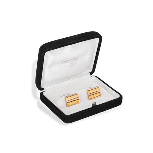 257 - A PAIR OF DIAMOND CUFFLINKS, BY FRED PARIS  The frontispiece composed of two brushed gold bars betwe... 