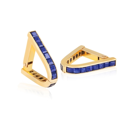 259 - A PAIR OF SAPPHIRE CUFFLINKS, FRENCH  Of stirrup design set with calibré-cut sapphires, mounted in 1... 