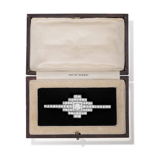 27 - AN ART DECO DIAMOND BROOCH, FRENCH, CIRCA 1925  Of pyramidal design, centring an old European-cut di... 