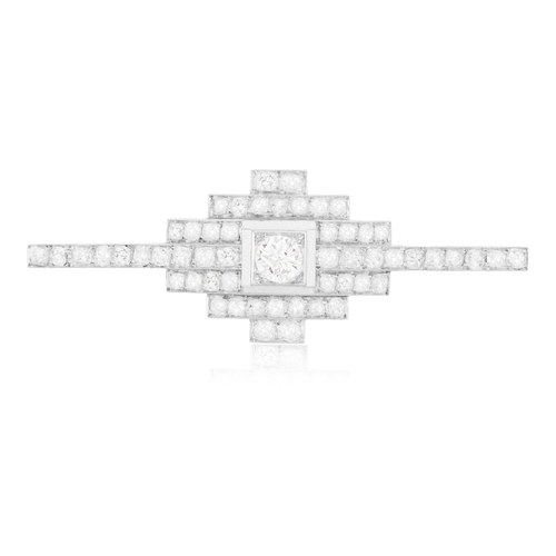 27 - AN ART DECO DIAMOND BROOCH, FRENCH, CIRCA 1925  Of pyramidal design, centring an old European-cut di... 