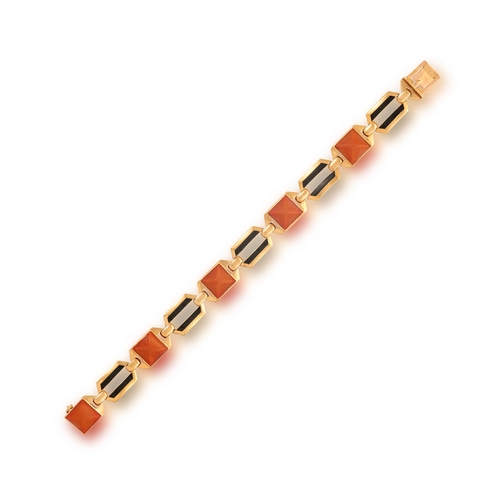 34 - A CORAL AND ENAMEL BRACELET, FRENCH, CIRCA 1950  Composed of alternating links, either set with a co... 