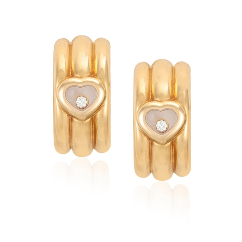 4 - A PAIR OF 'HAPPY DIAMONDS' EARRINGS, BY CHOPARD  Each reeded hoop accented with a central heart-shap... 