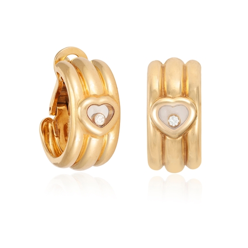 4 - A PAIR OF 'HAPPY DIAMONDS' EARRINGS, BY CHOPARD  Each reeded hoop accented with a central heart-shap... 