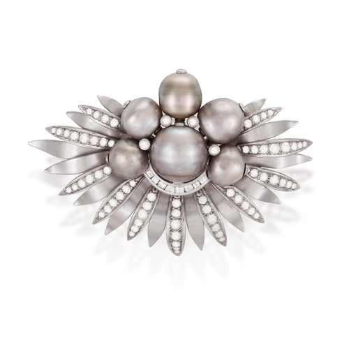 41 - A CULTURED PEARL AND DIAMOND BROOCH, CIRCA 1960  Of fan-shaped palm design, centring a cultured pear... 