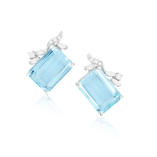 45 - A PAIR OF AQUAMARINE AND DIAMOND EARCLIPS  Each set with a rectangular-cut aquamarine, each weighing... 