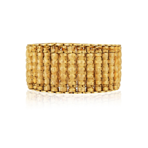 62 - A GOLD BRACELET, BY RICCARDO MASELLA, CIRCA 1955  Of openwork articulated design, the textured gold ... 