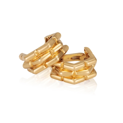 67 - A PAIR OF GOLD EARCLIPS, BY PÉRY & FILS  Each polished gold earclip with fluted detailing, mounted i... 