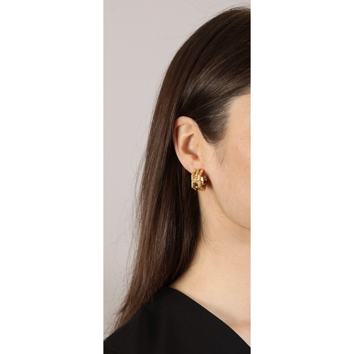 67 - A PAIR OF GOLD EARCLIPS, BY PÉRY & FILS  Each polished gold earclip with fluted detailing, mounted i... 