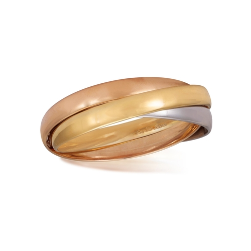 7 - A GOLD 'TRINITY' BANGLE, BY CARTIER  Composed of three interlocking polished 18K tri-coloured gold b... 