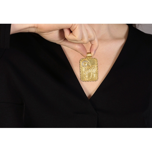 70 - A DIAMOND AND GOLD ZODIAC PENDANT, BY FRED PARIS, CIRCA 1975  The rectangular plaque depicting the A... 