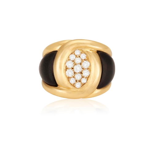 80 - A SNAKEWOOD AND DIAMOND RING, BY VAN CLEEF & ARPELS  The central navette motif pavé-set with brillia... 