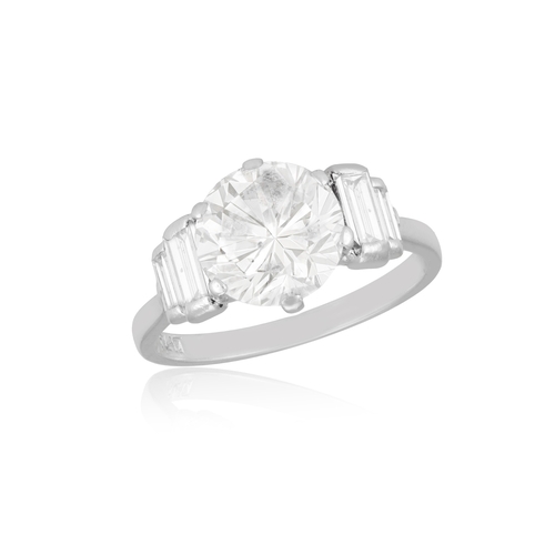 85 - A DIAMOND SINGLE-STONE RING   The brilliant-cut diamond weighing approximately 2.60cts within a six-... 